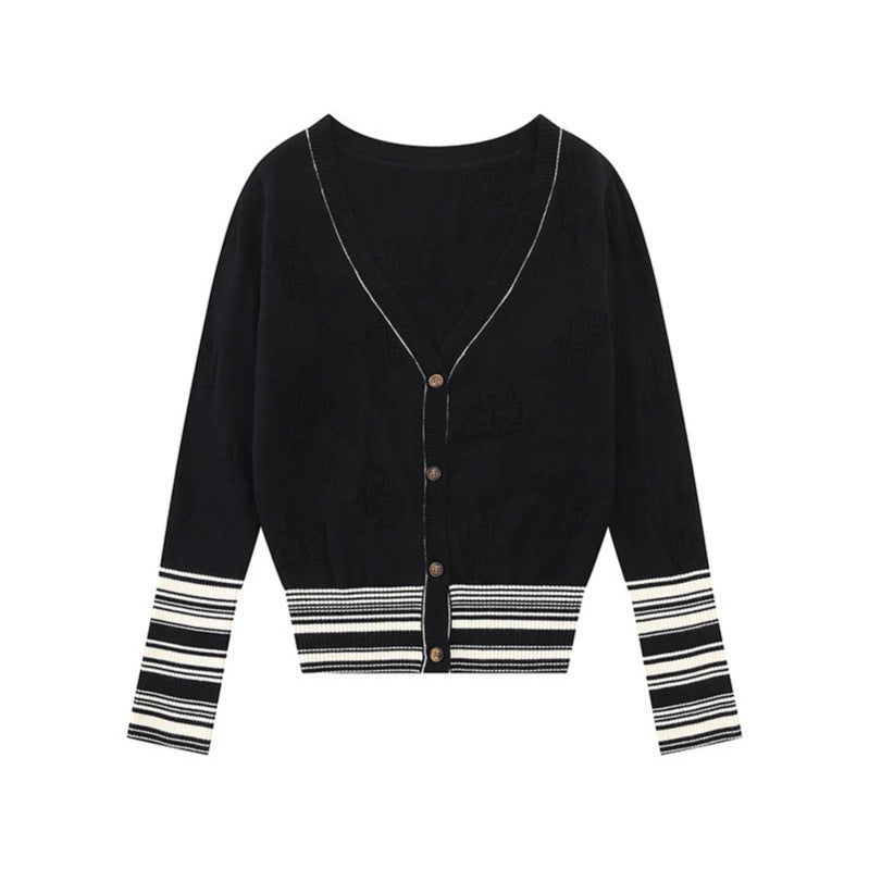 Ladies cardigan with V-neck, fine jacquard pattern and contrasting cuffs Chichicherry
