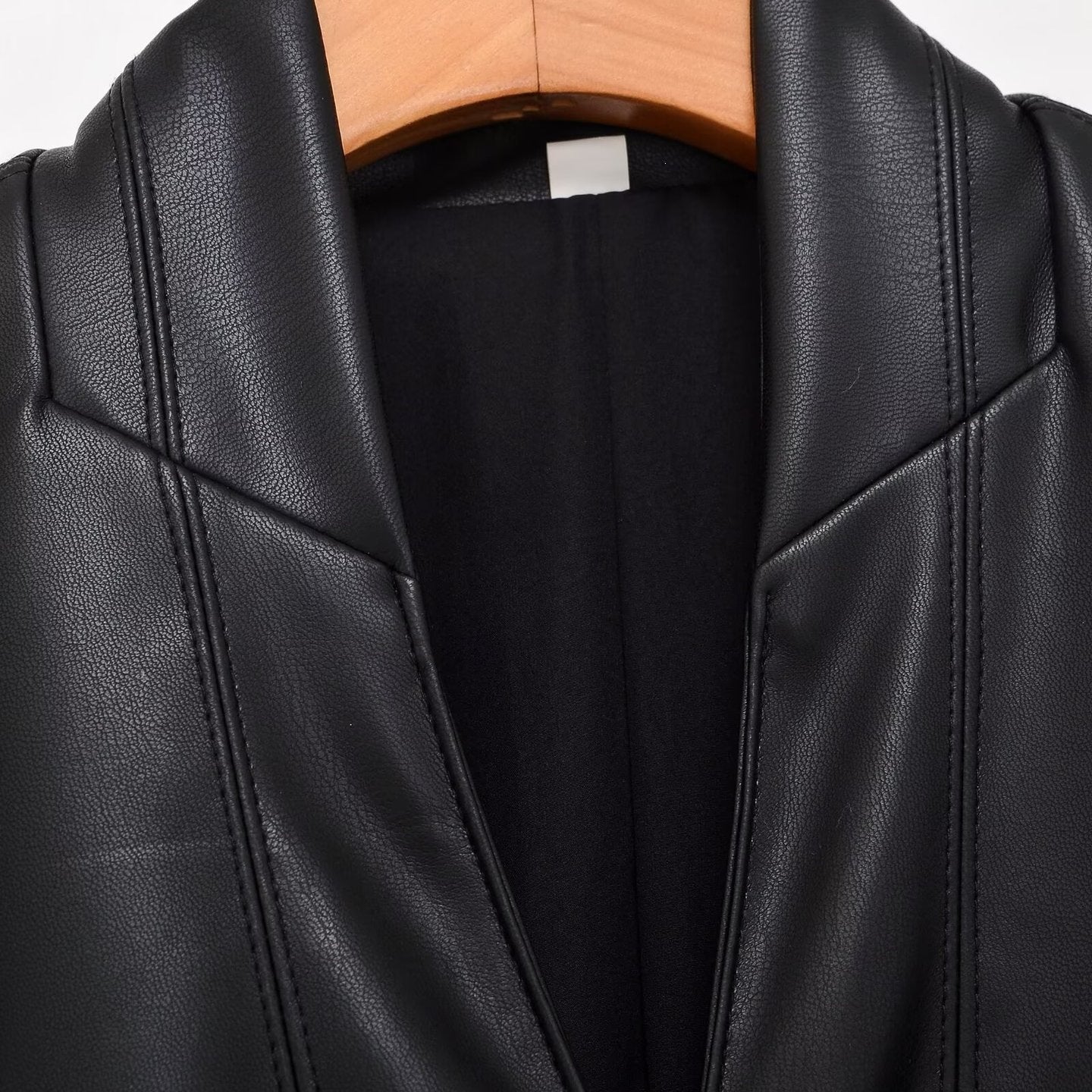 Women's tailored double-breasted faux leather midi coat with shawl collar and patch pockets Chichicherry