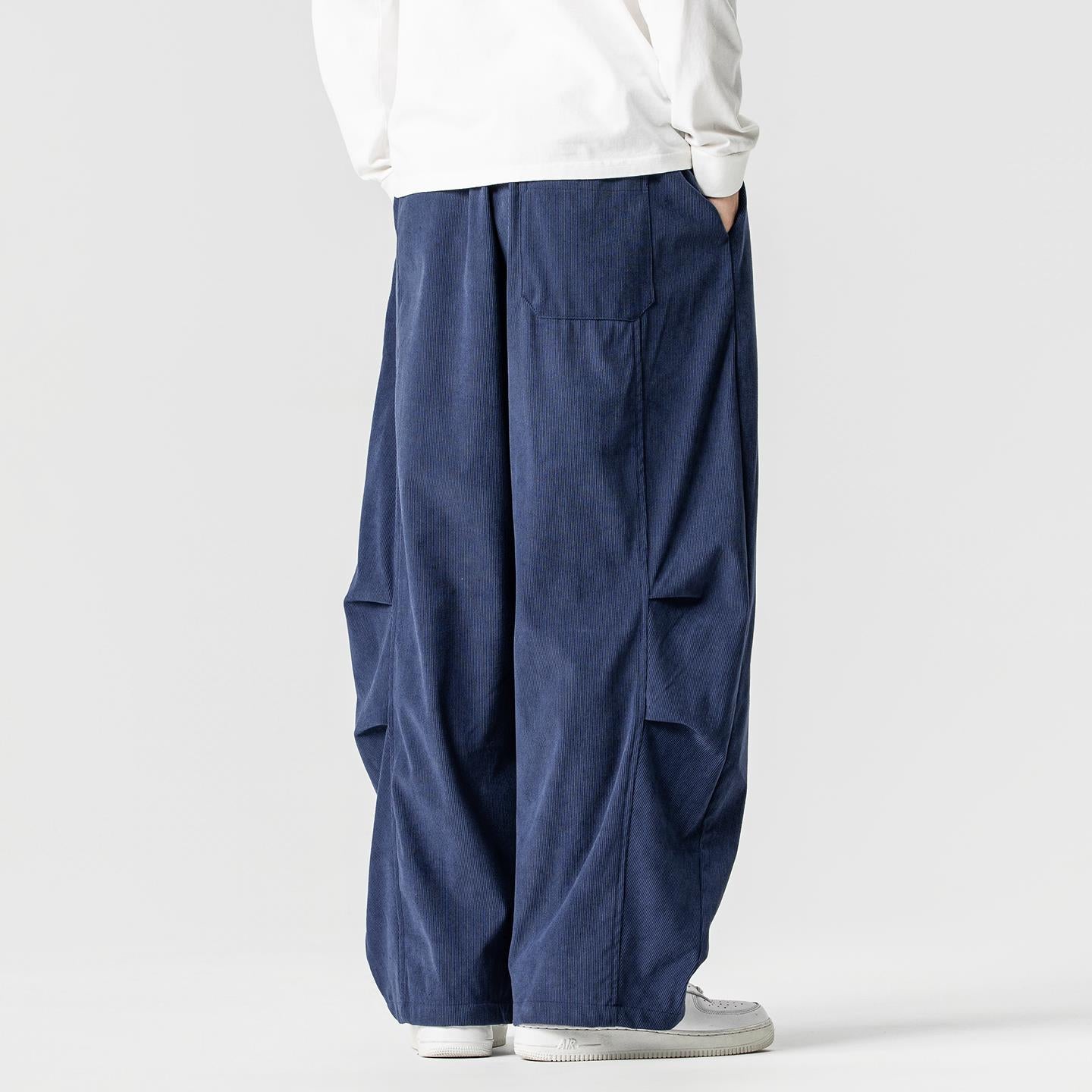 Men's wide-cut corduroy pants with pleats, drawstring, and casual baggy silhouette Chichicherry