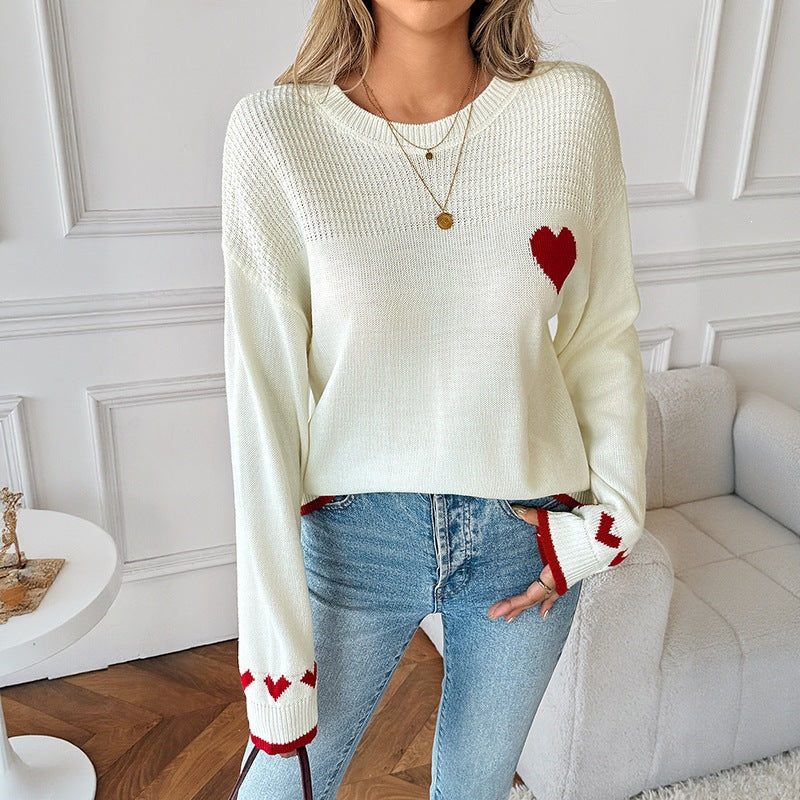 Women's knitted fine knit pullover with heart intarsias, round neckline and ribbed cuffs Chichicherry