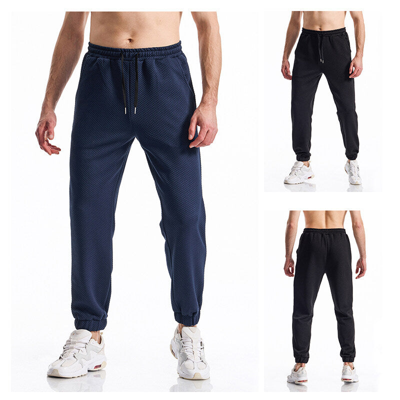 Men's Textured Jogging Pants with Elastic Waistband, Drawstring, and Cuffed Hem Chichicherry