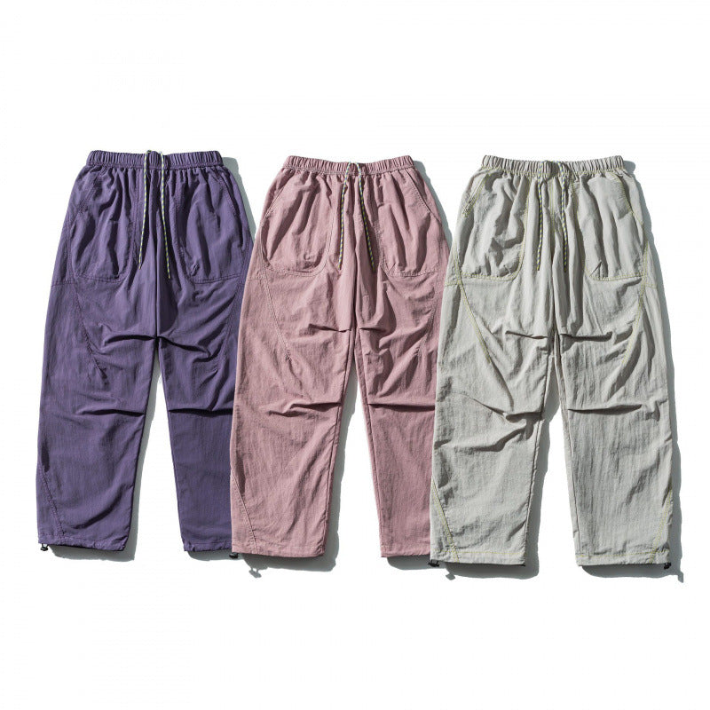 Unisex Loose-fitting outdoor pants with elastic waistband, drawstring, and adjustable leg cuffs Chichicherry
