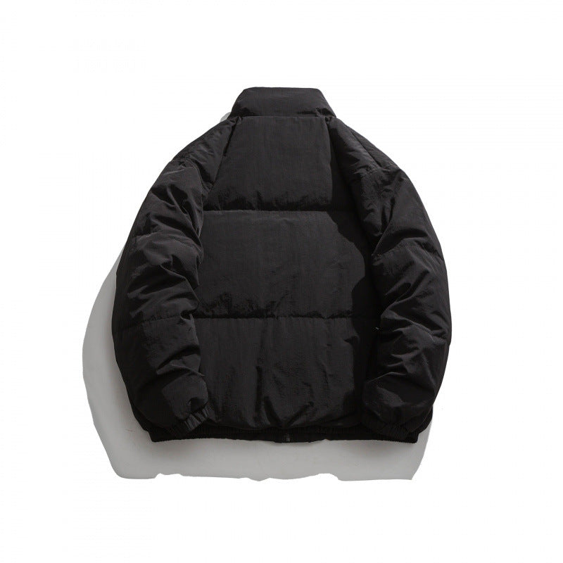 Unisex Oversized padded quilted jacket with high stand collar, large flap pockets and crinkle effect Chichicherry