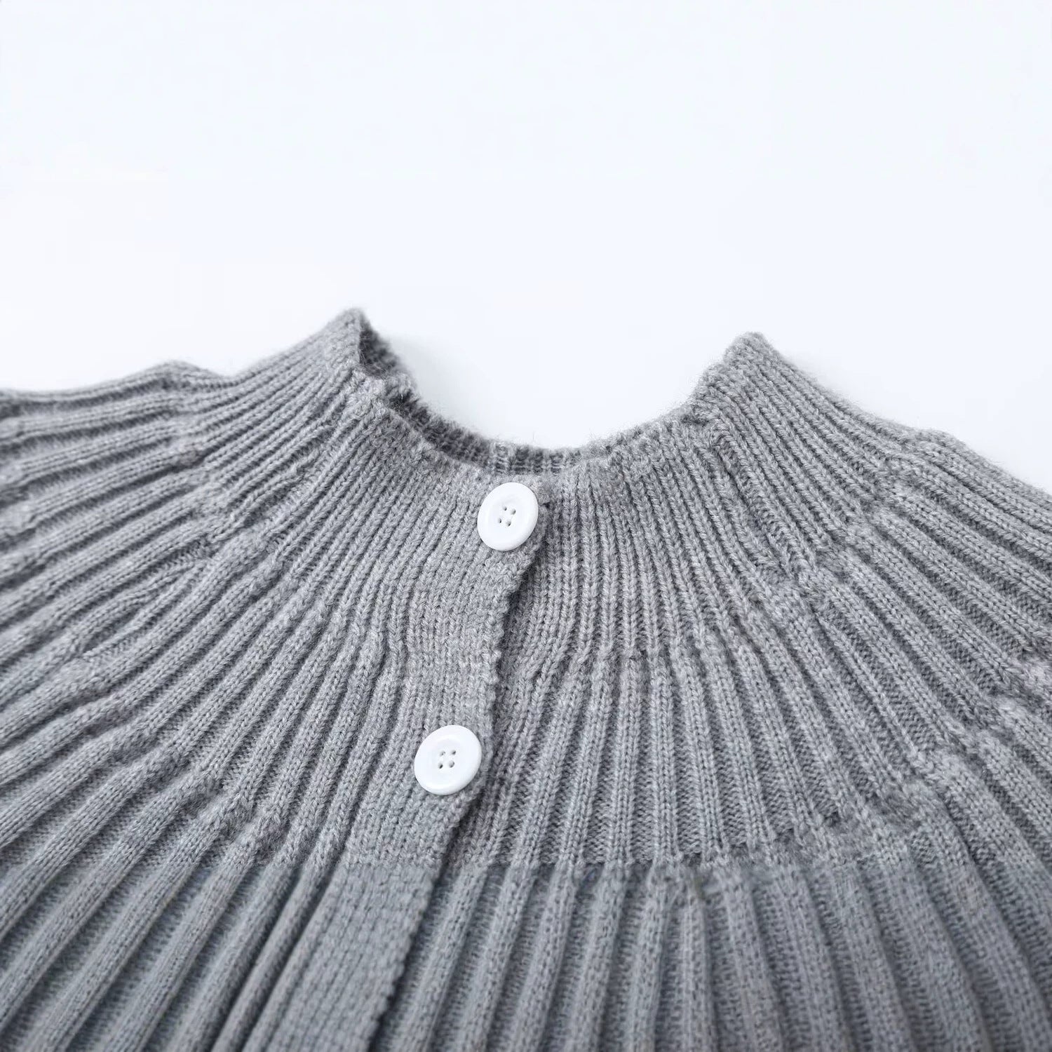 Women's structured cardigan with round yoke, textured stitch pattern and button placket Chichicherry