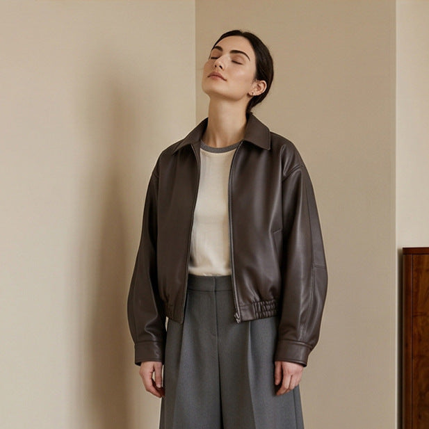 Women Boxy Cropped Faux Leather Jacket with Concealed Zipper and Elastic Hem Chichicherry
