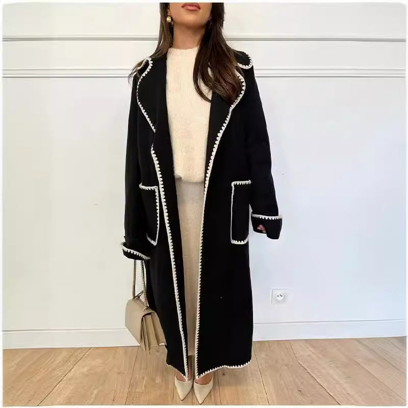 Women’s wrap coat made of wool blend with scalloped trim and tie belt Chichicherry