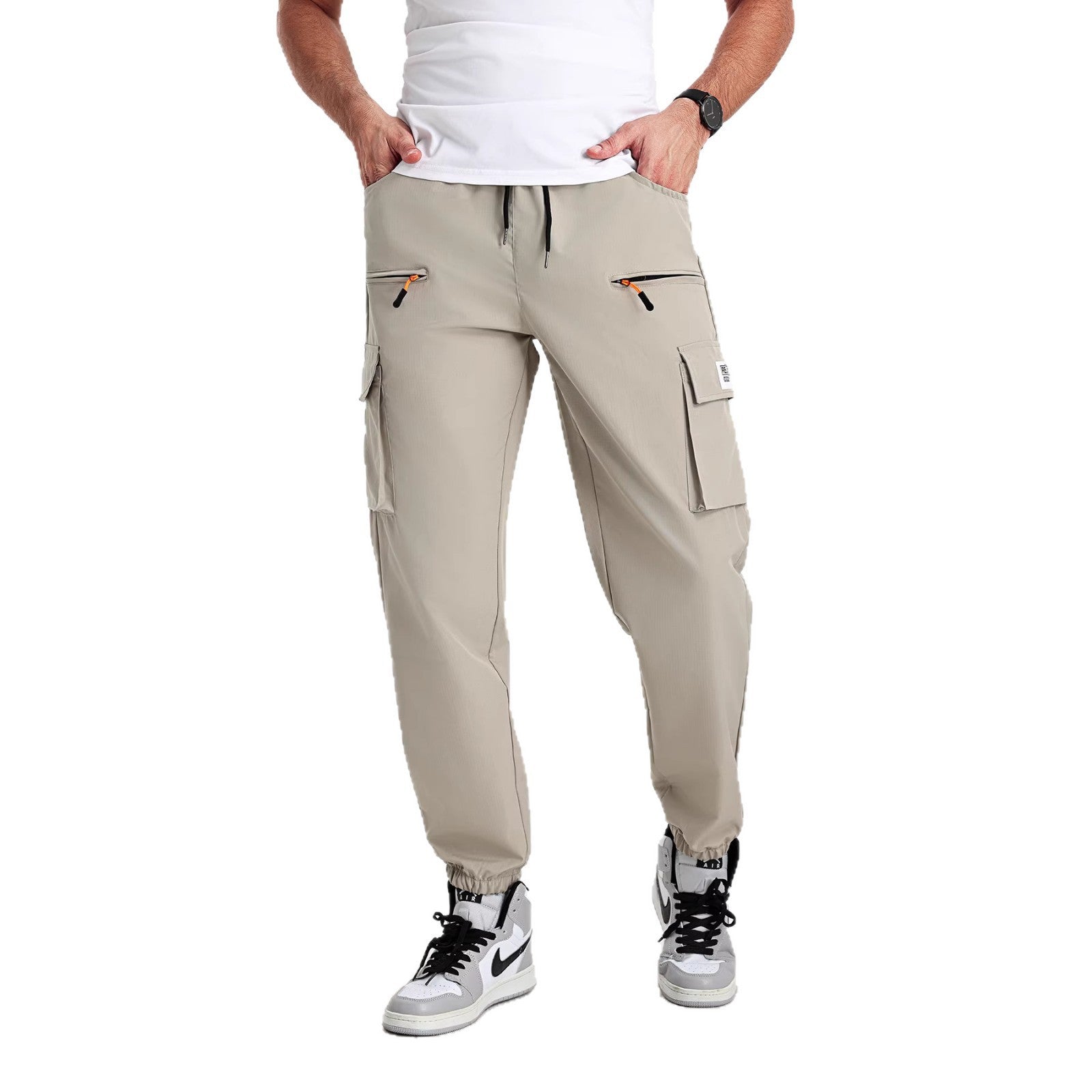 Men's tapered cut utility cargo pants in jogger style with drawstring waistband, zippered pockets & elastic leg cuffs Chichicherry
