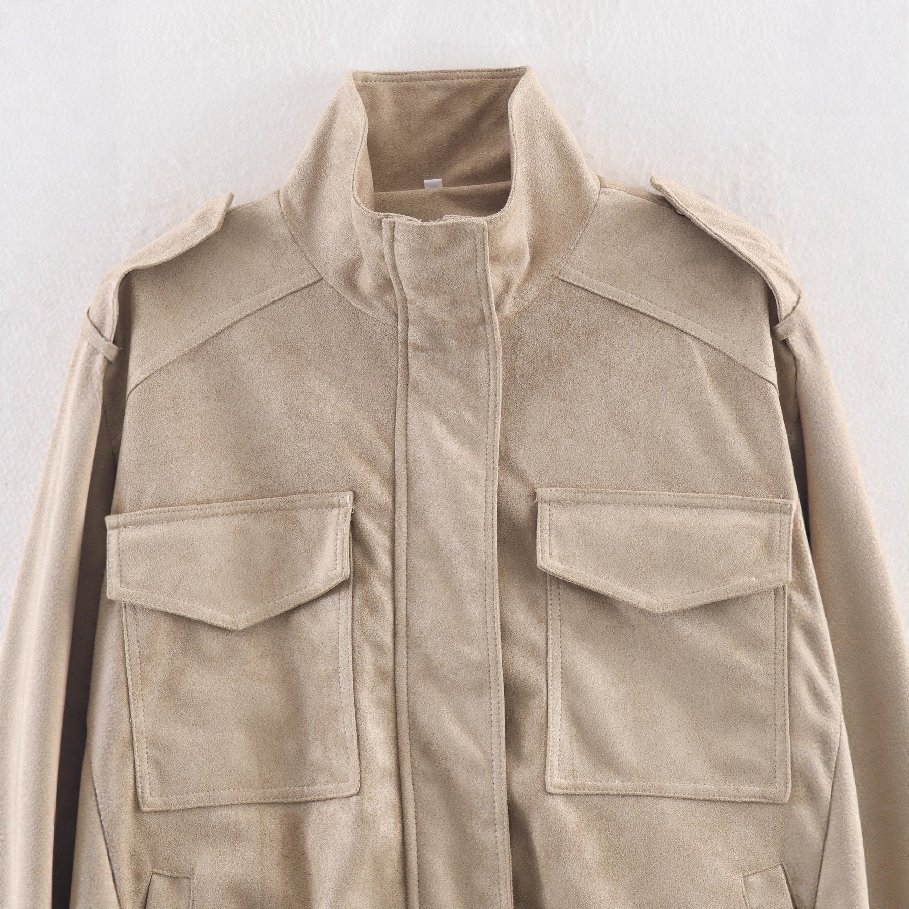 Women’s short jacket in military style with epaulets, patch chest pockets, and elastic hem Chichicherry