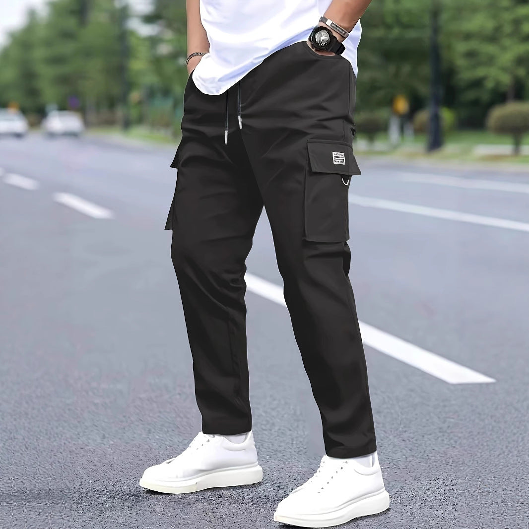 Men's Slim-Tapered Cargo Jogging Pants with Drawstring Waist, Flap Pockets and Metal Ring Detail Chichicherry