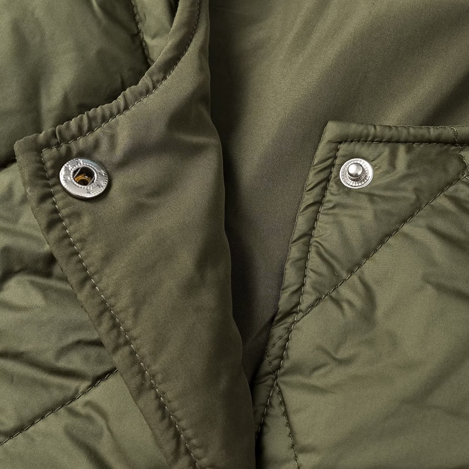 Women's quilted jacket without collar with snap button closure and patch pockets Chichicherry