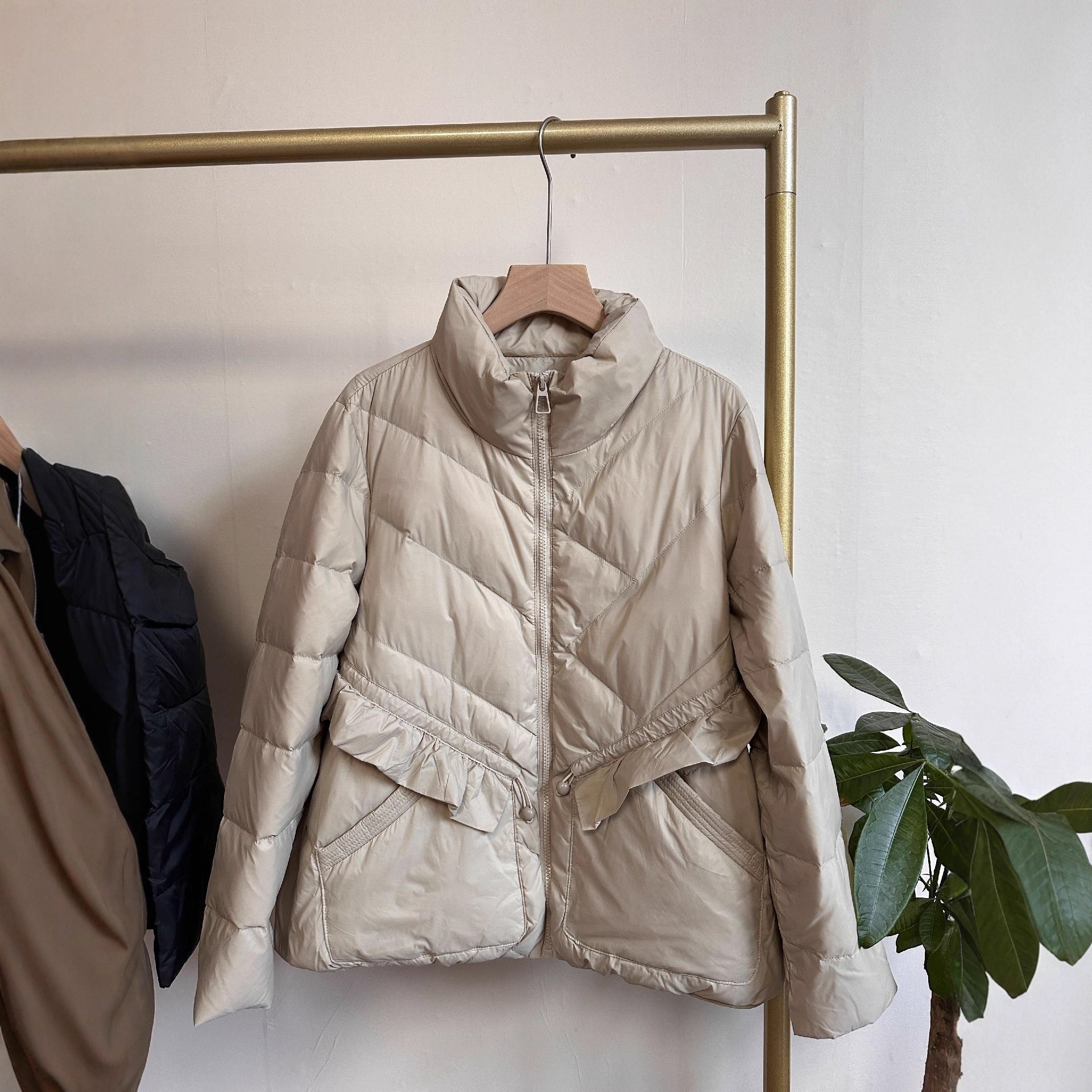 Women's quilted parka with stand-up collar, tailored ruffle detail and thermal insulation Chichicherry
