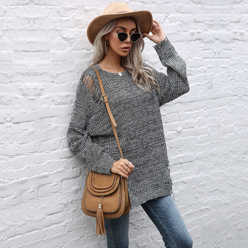 Ladies chunky knit oversized sweater with open stitches, raw hem and round neckline Chichicherry