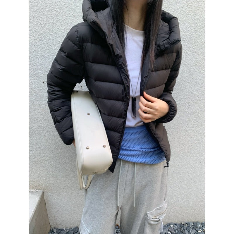 Women's quilted down jacket with high collar and light thermal insulation Chichicherry