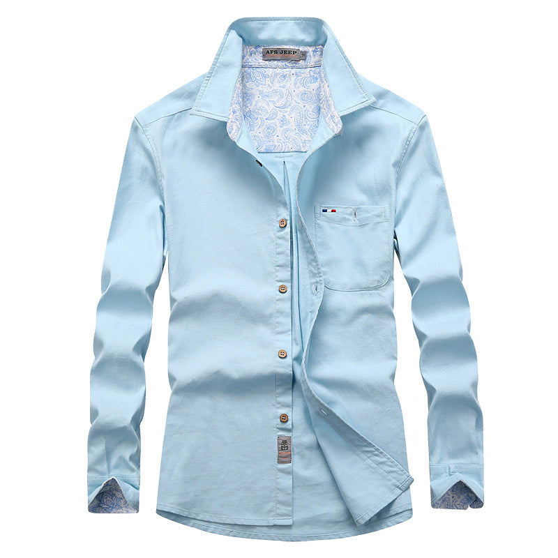 Men's long-sleeve shirt in worker canvas style with chest pocket and patterned collar lining Chichicherry