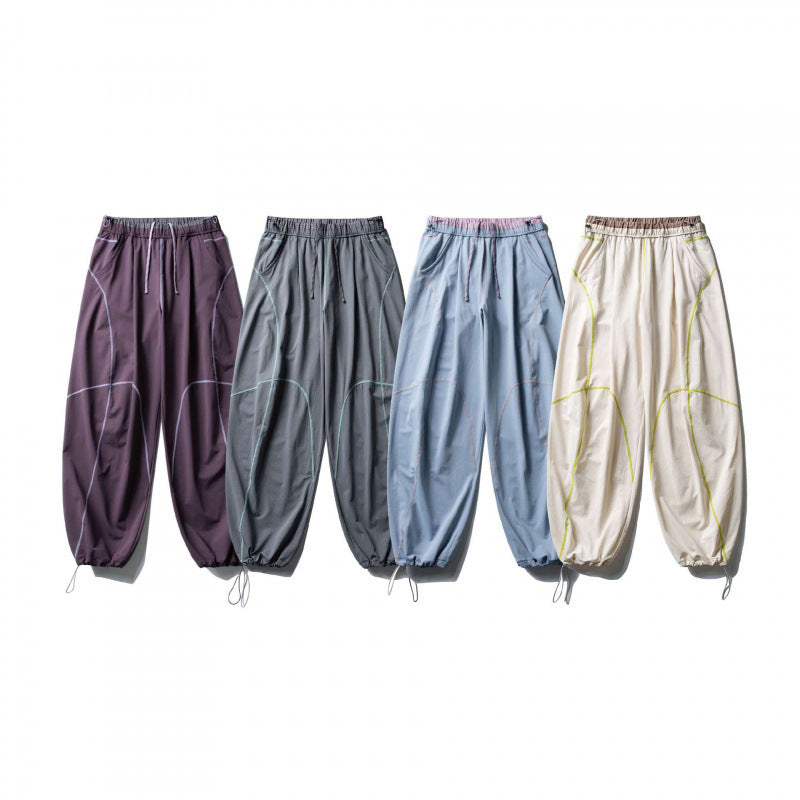 Unisex locker cut tech jogging pants with elastic waistband, distinctive flatlock seams and drawstring Chichicherry