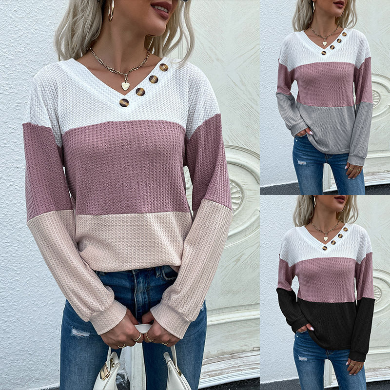 Women's yarn-structured color block pullover with V-neck and decorative button placket Chichicherry