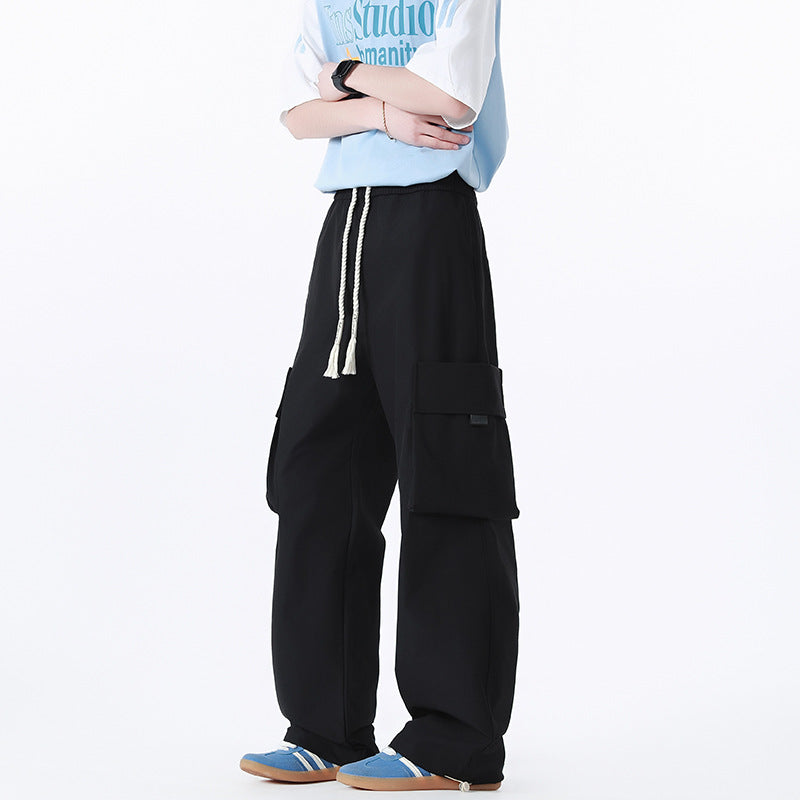 Men's Loose Cargo Pants in Oversized Cut with Oversized Flap Pockets and Drawstring Waist Chichicherry