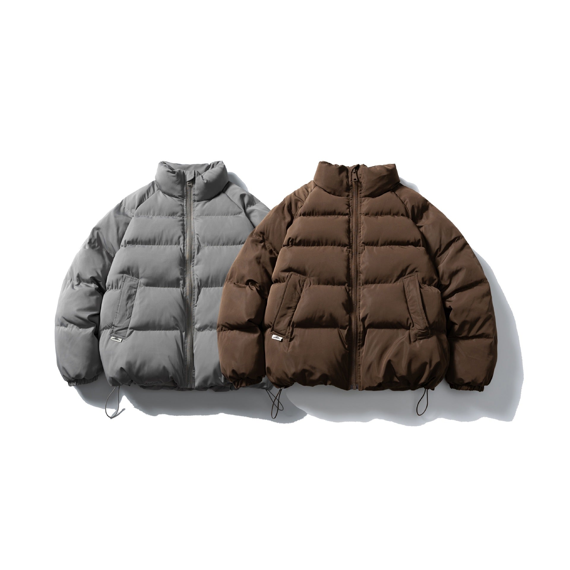 Unisex Short Cut Quilted Jacket in Boxy Cut with High Collar and Drawstring Chichicherry