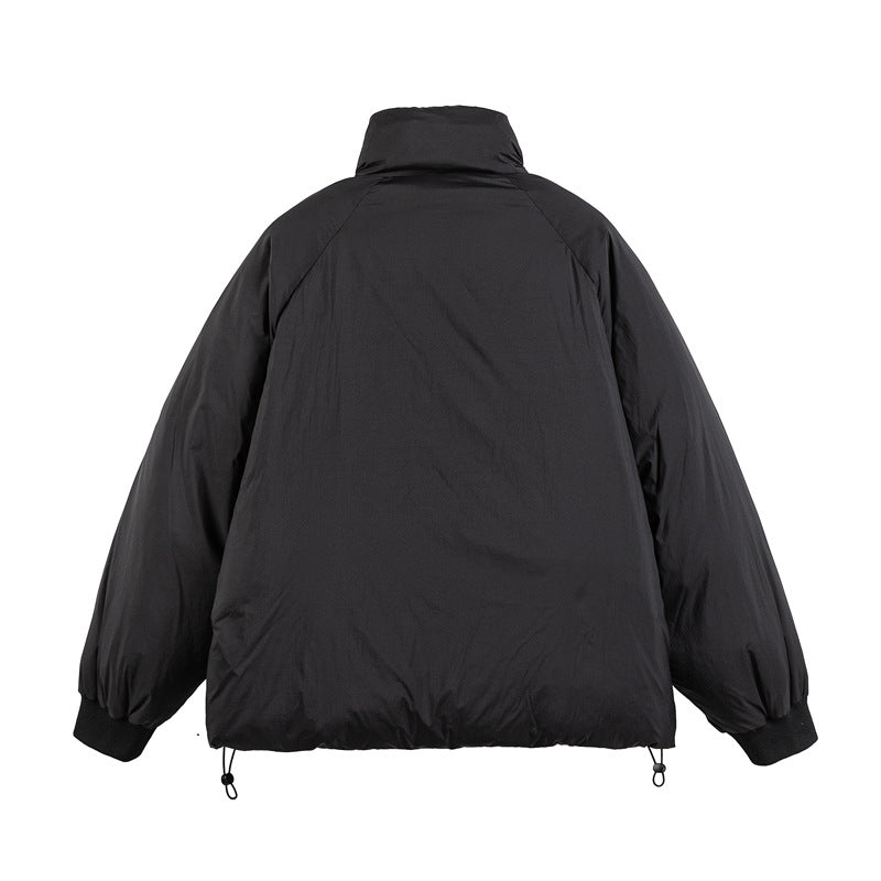 Unisex Boxy-padded short jacket with high stand-up collar, raglan sleeves and drawstring hem Chichicherry