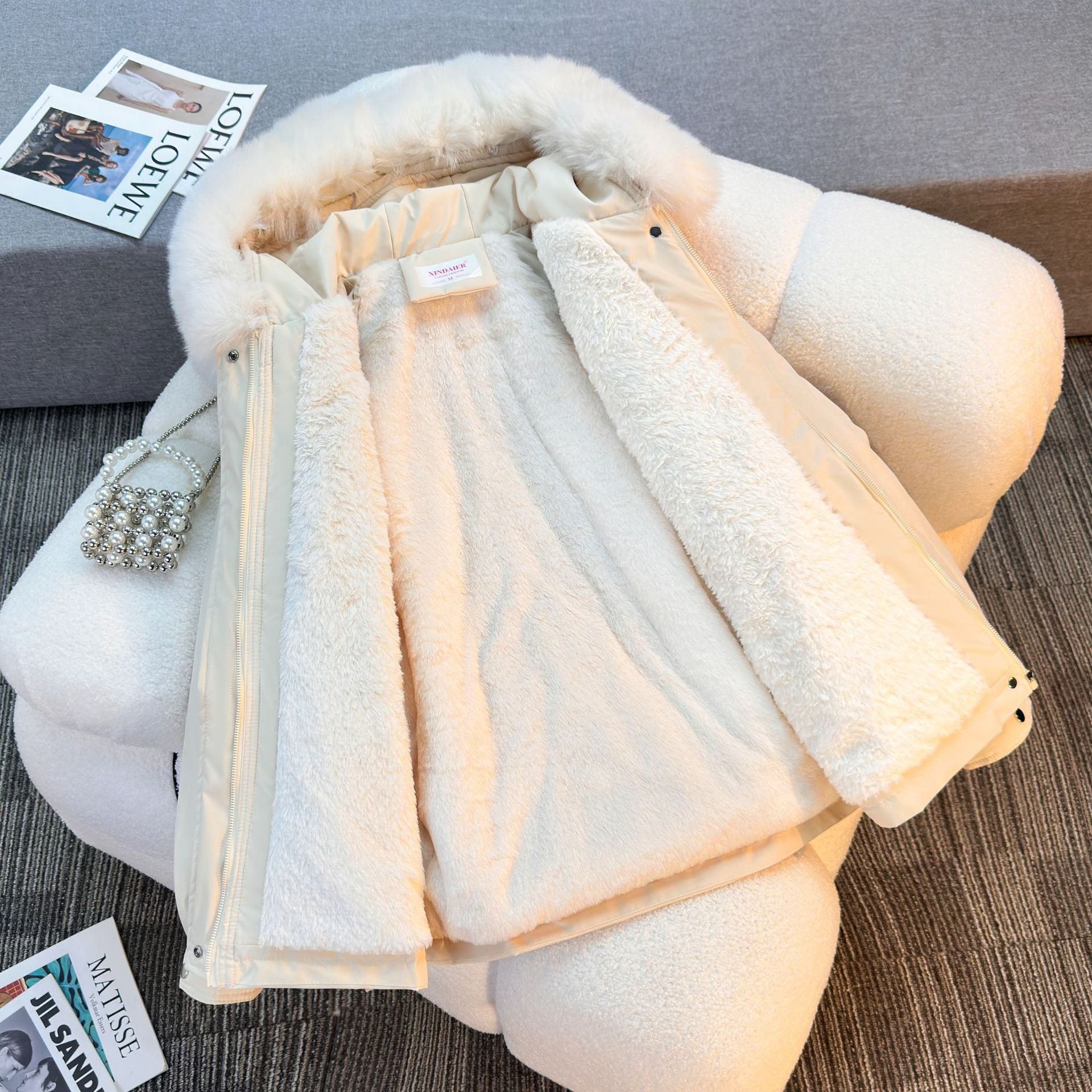 Women's short padded parka with faux fur collar, teddy lining, drawstring waist, and multifunctional pockets Chichicherry