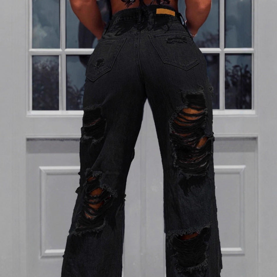 Ladies high-waisted destroyed jeans with wide legs and large knee rips Chichicherry