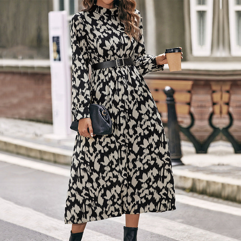 Women's midi dress with animal-inspired print, stand collar and fitted belt Chichicherry