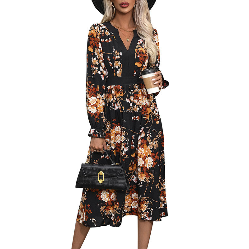 Women’s midi dress with fitted waist, V-neck, long sleeves, and floral all-over print Chichicherry