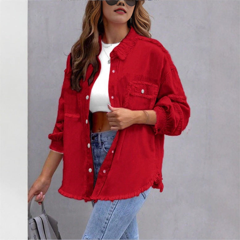 Women's oversized denim shirt jacket with fringe trim, flap pockets, and snap front Chichicherry