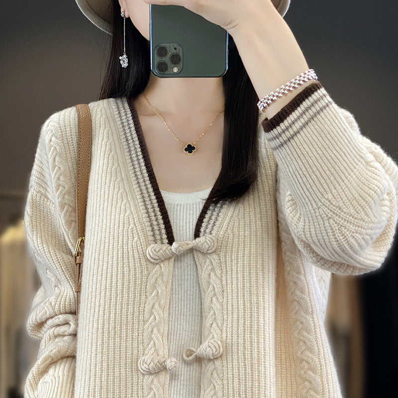 Women's knitted cardigan with cable pattern and decorative knot closures Chichicherry