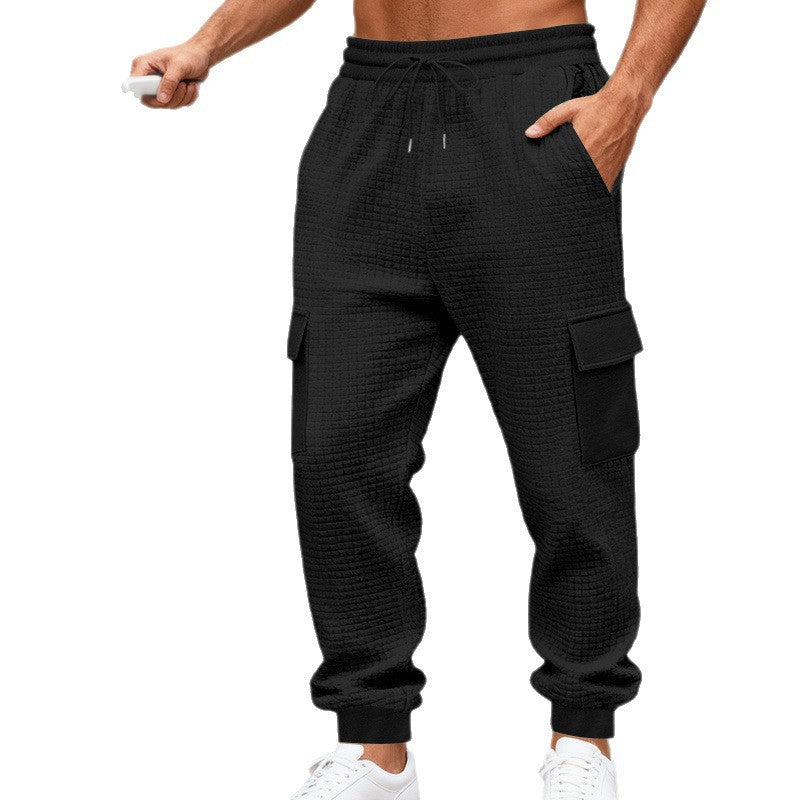 Men's cargo joggers with distinctive waffle texture, elastic waistband, and large flap pockets Chichicherry