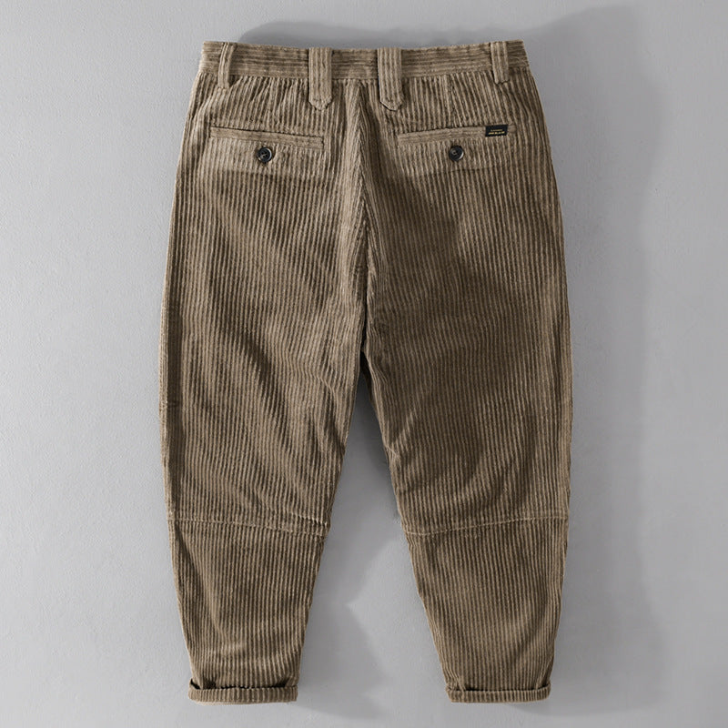 Men's corduroy pants with a tapered cut, high waistband, checked inner band, and rolled hem Chichicherry