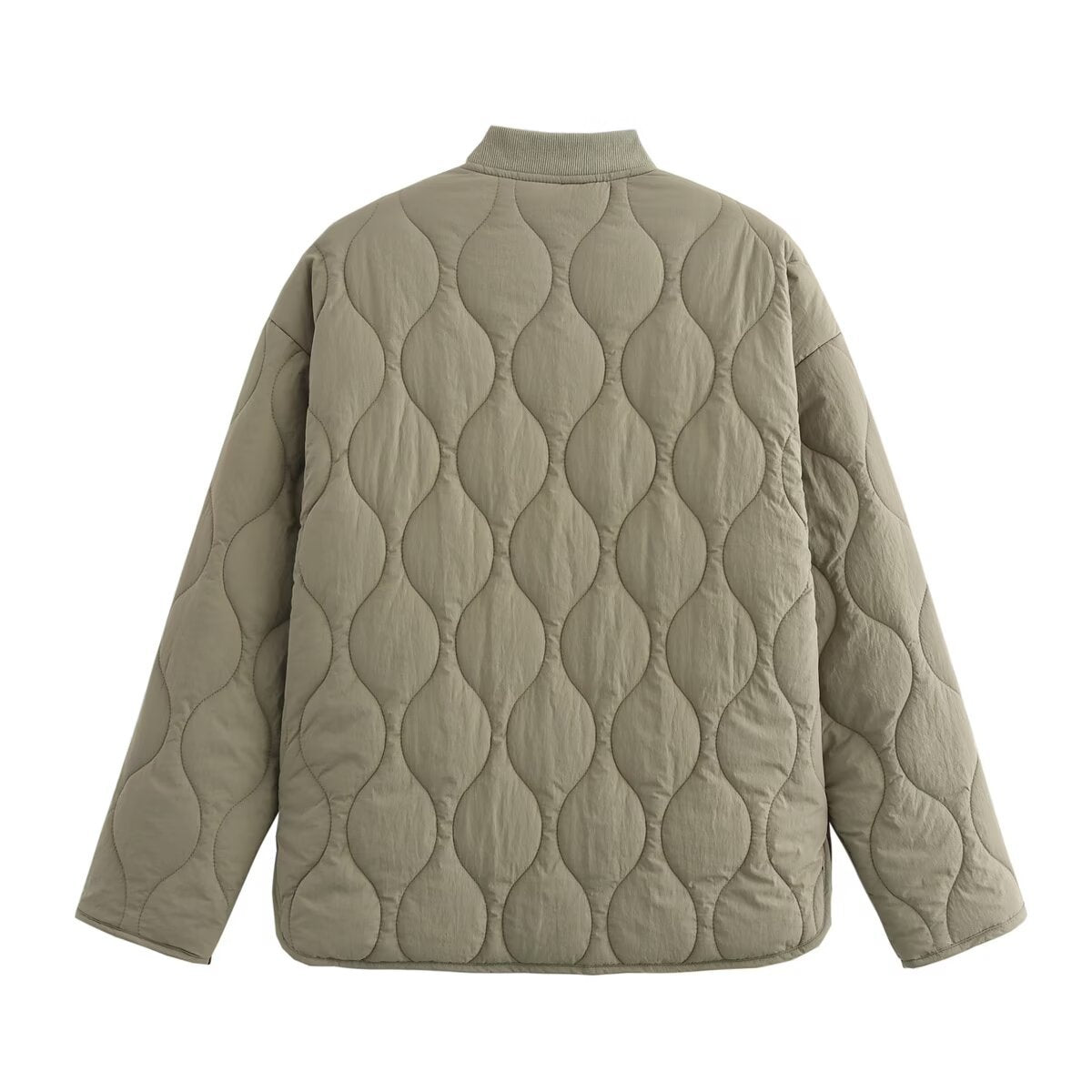Women's quilted jacket with round neck, flap pockets, and reversible lining Chichicherry