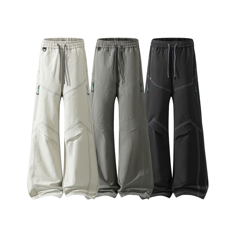 Men's Wide Cargo Pants with Drawstring Waistband, Utility Seams and Zip Pockets Chichicherry