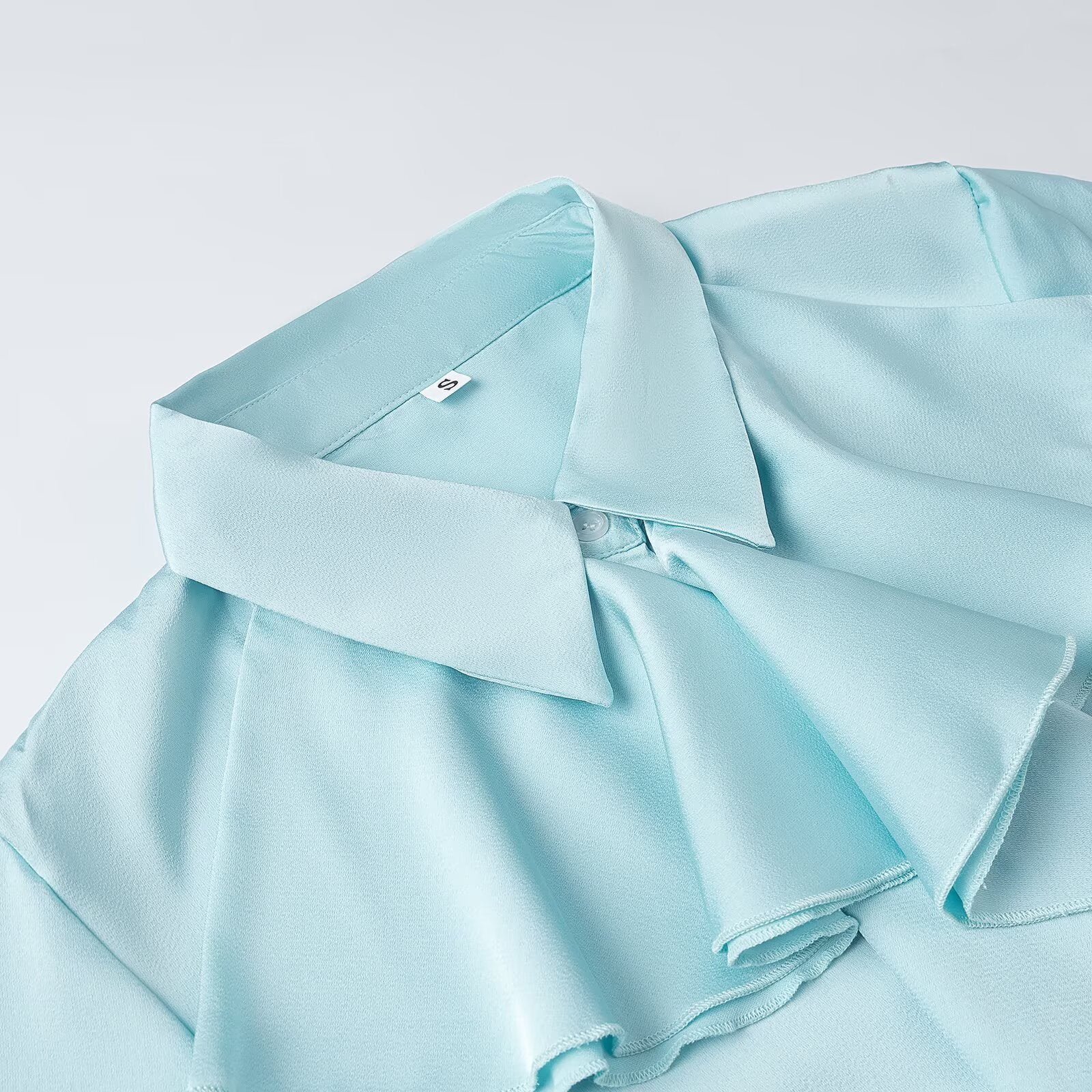 Women's Bow Blouse with Ruffled Front and Ruffled Hem Chichicherry