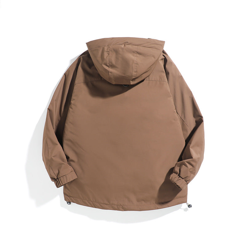 Unisex Wide cut weatherproof parka with hood, drawstring and patch pockets Chichicherry