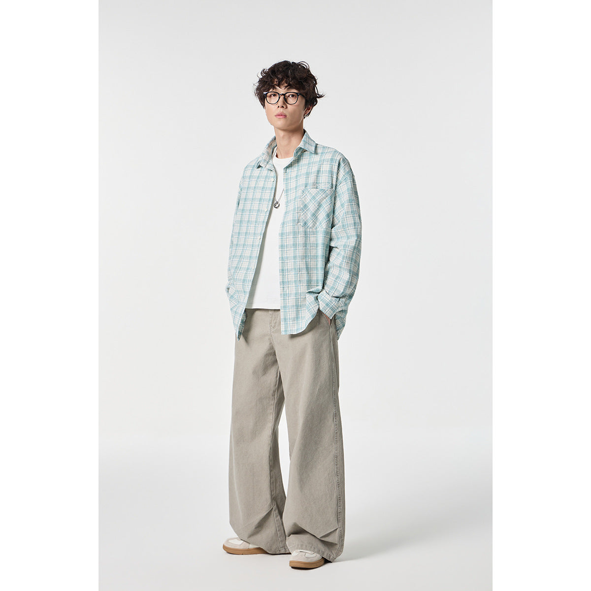 Unisex Oversize Check Shirt Jacket made of lightweight cotton blend with a patch chest pocket Chichicherry