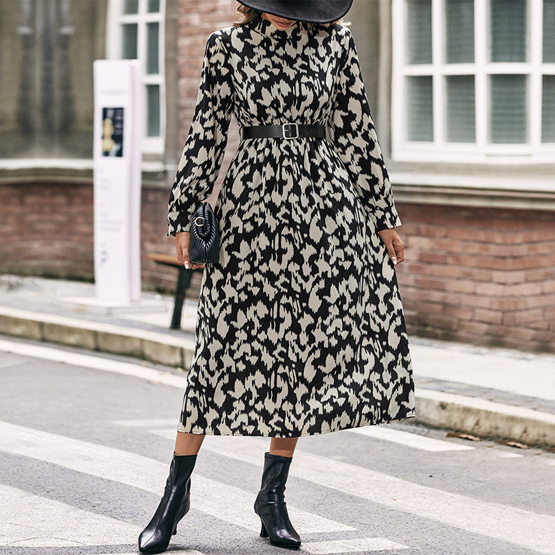 Women's midi dress with animal-inspired print, stand collar and fitted belt Chichicherry