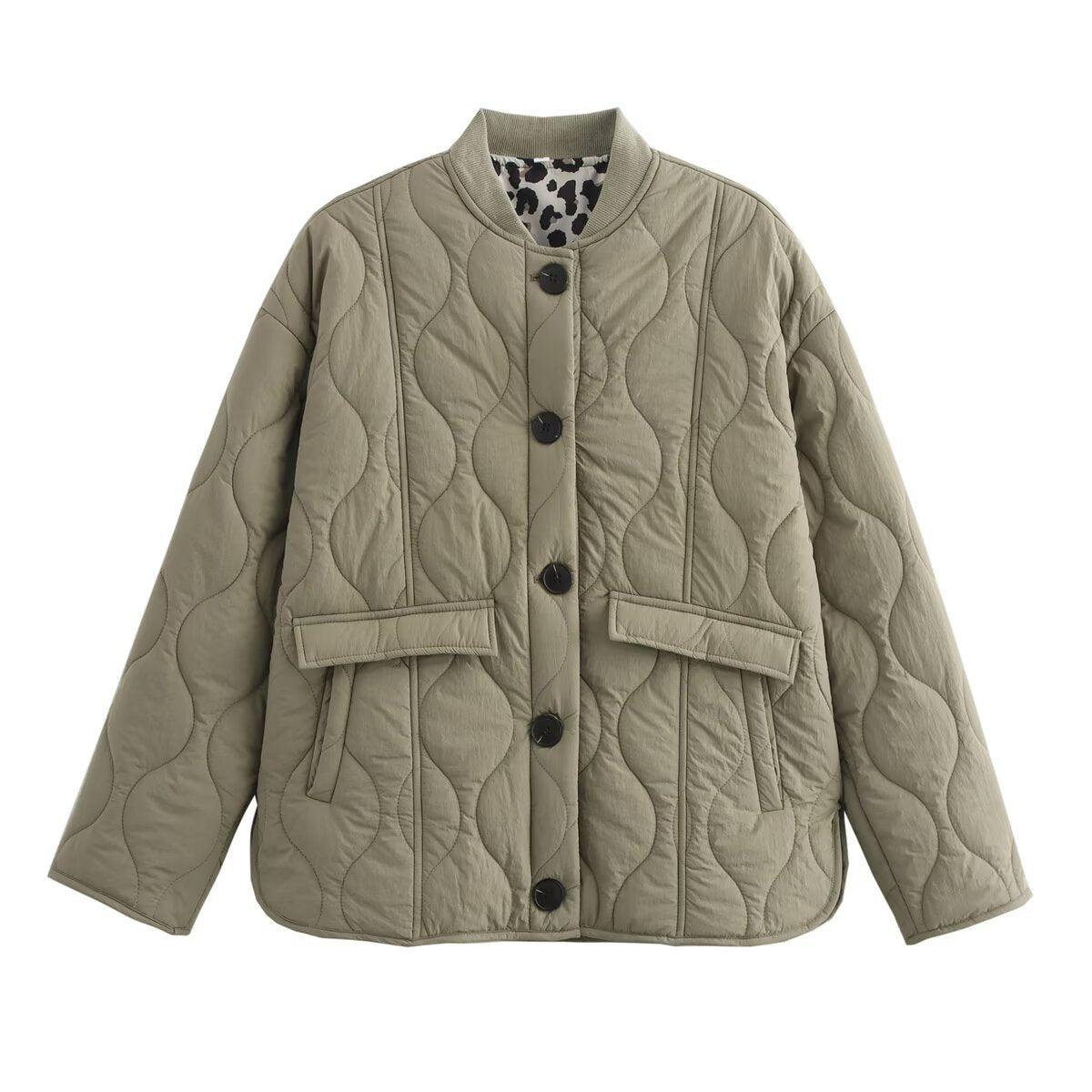 Women's quilted jacket with round neck, flap pockets, and reversible lining Chichicherry