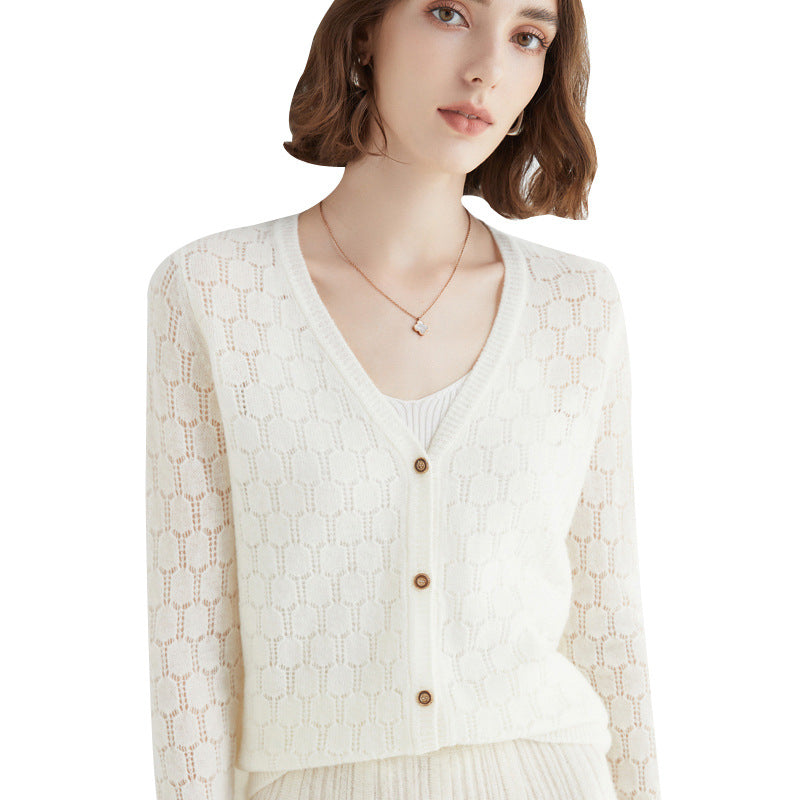 Women's ultralight mock neck pullover made of cashmere-like fine knit with extended hemline.
