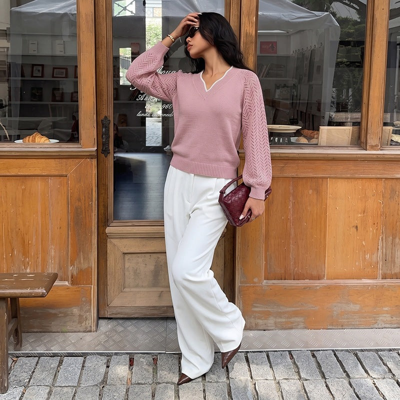 Women's fine knit sweater with deep V-neck, openwork sleeves, and ribbed hem Chichicherry