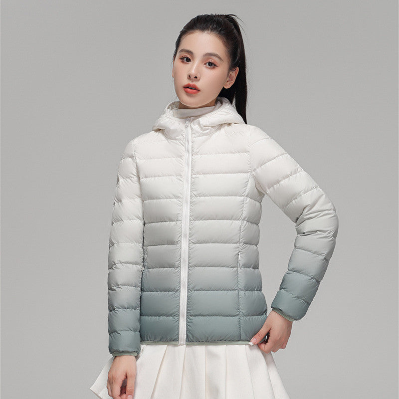 Women's ultra-lightweight hooded quilted jacket with compact pack size and wind-resistant shell Chichicherry