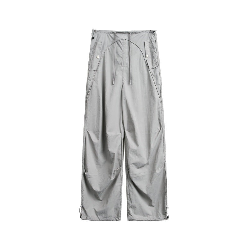 Women's wide cargo pants with drawstring waistband and adjustable hem