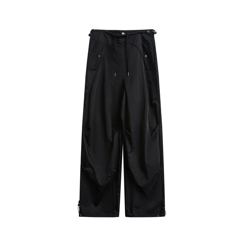 Women's wide cargo pants with drawstring waistband and adjustable hem