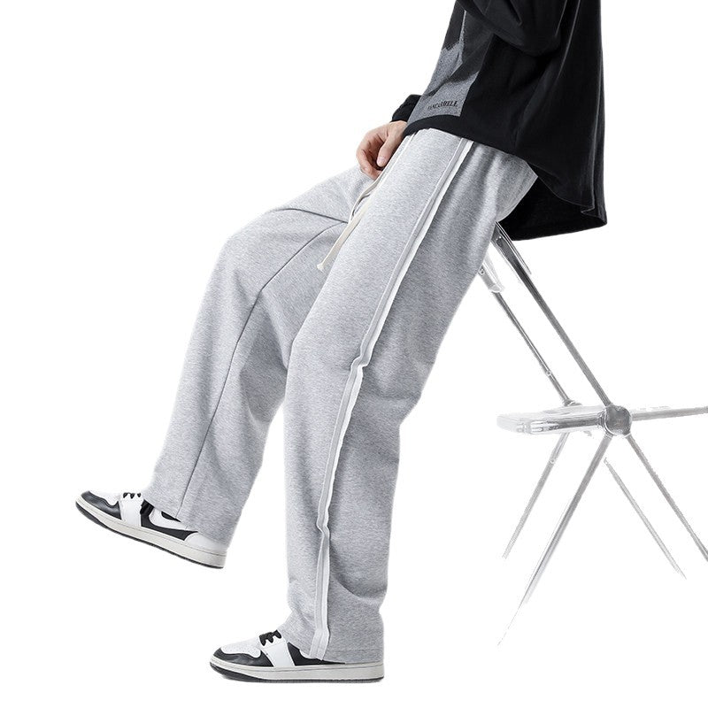 Men's wide jogging pants in oversized fit with side stripes, drawstring & fleece lining Chichicherry