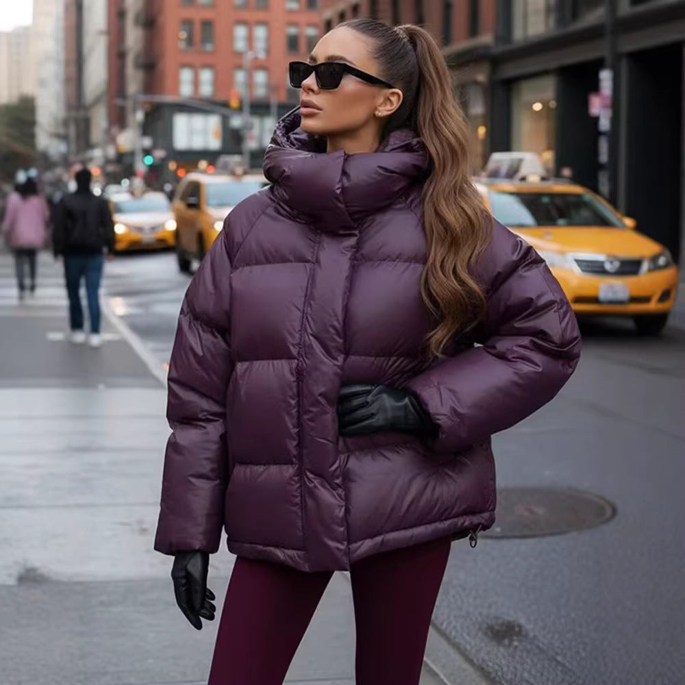 Ladies short padded oversized quilted jacket with high standing collar and hood Chichicherry