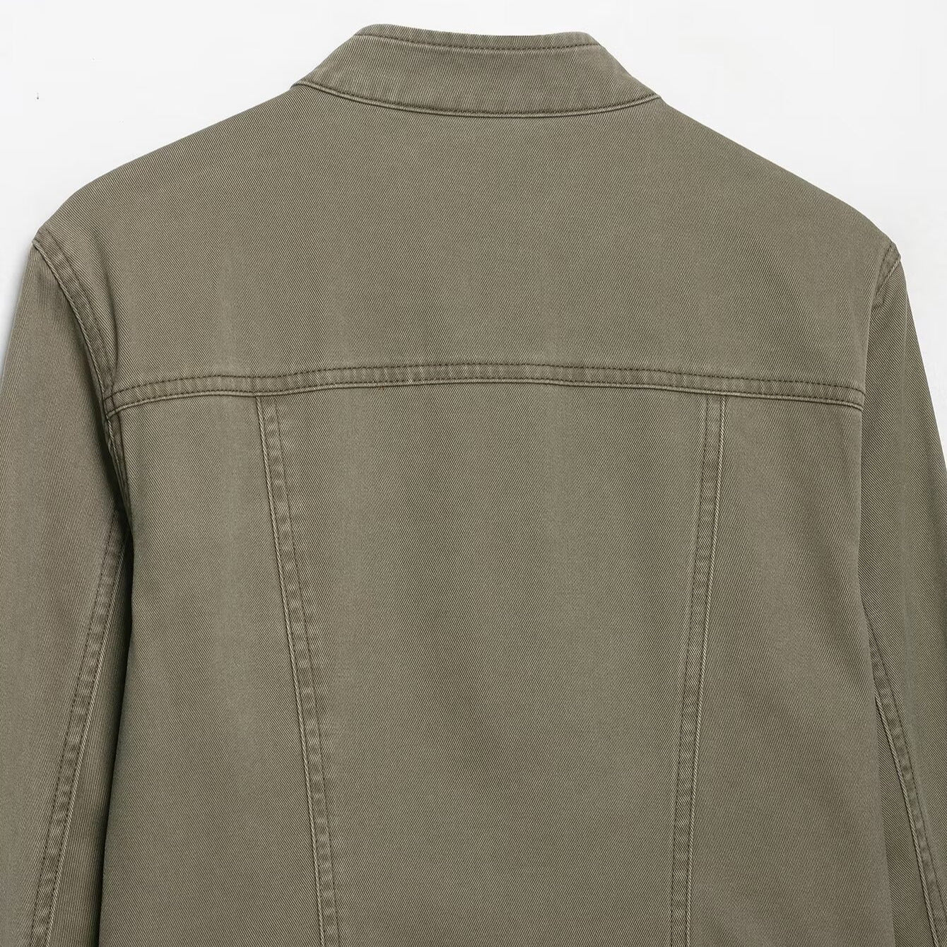 Ladies military-inspired short jacket with stand-up collar, decorative flaps and zipper Chichicherry