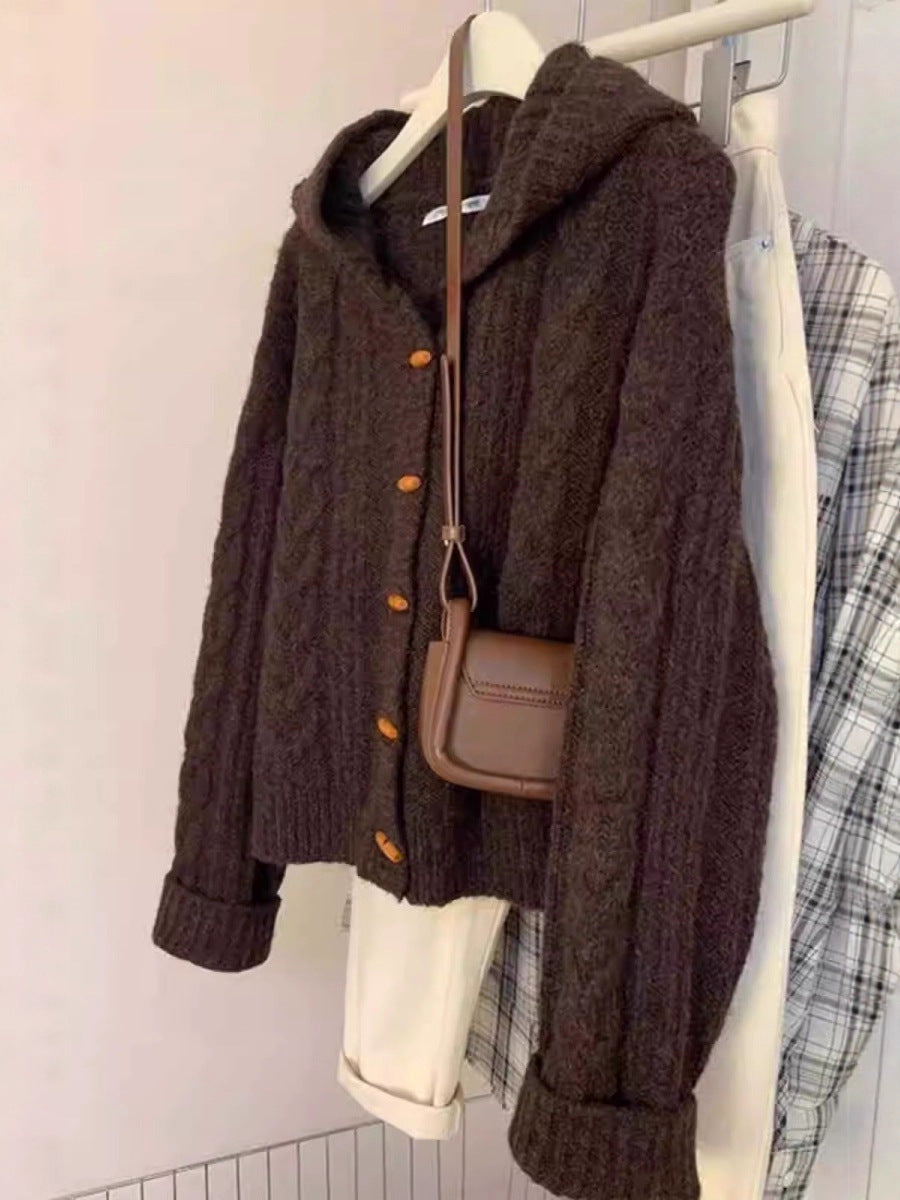Ladies hooded cardigan with cable knit, wooden button placket and boxy silhouette Chichicherry