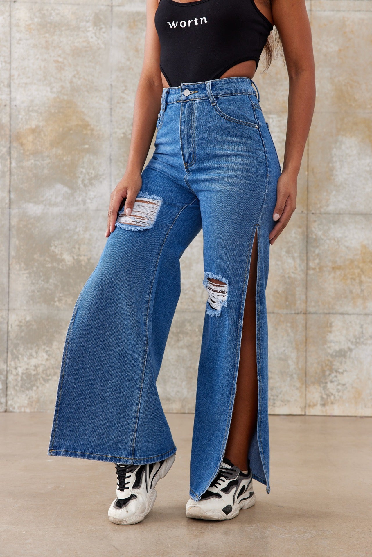 Women's high-waisted wide-leg jeans with large knee rips and side leg slits Chichicherry