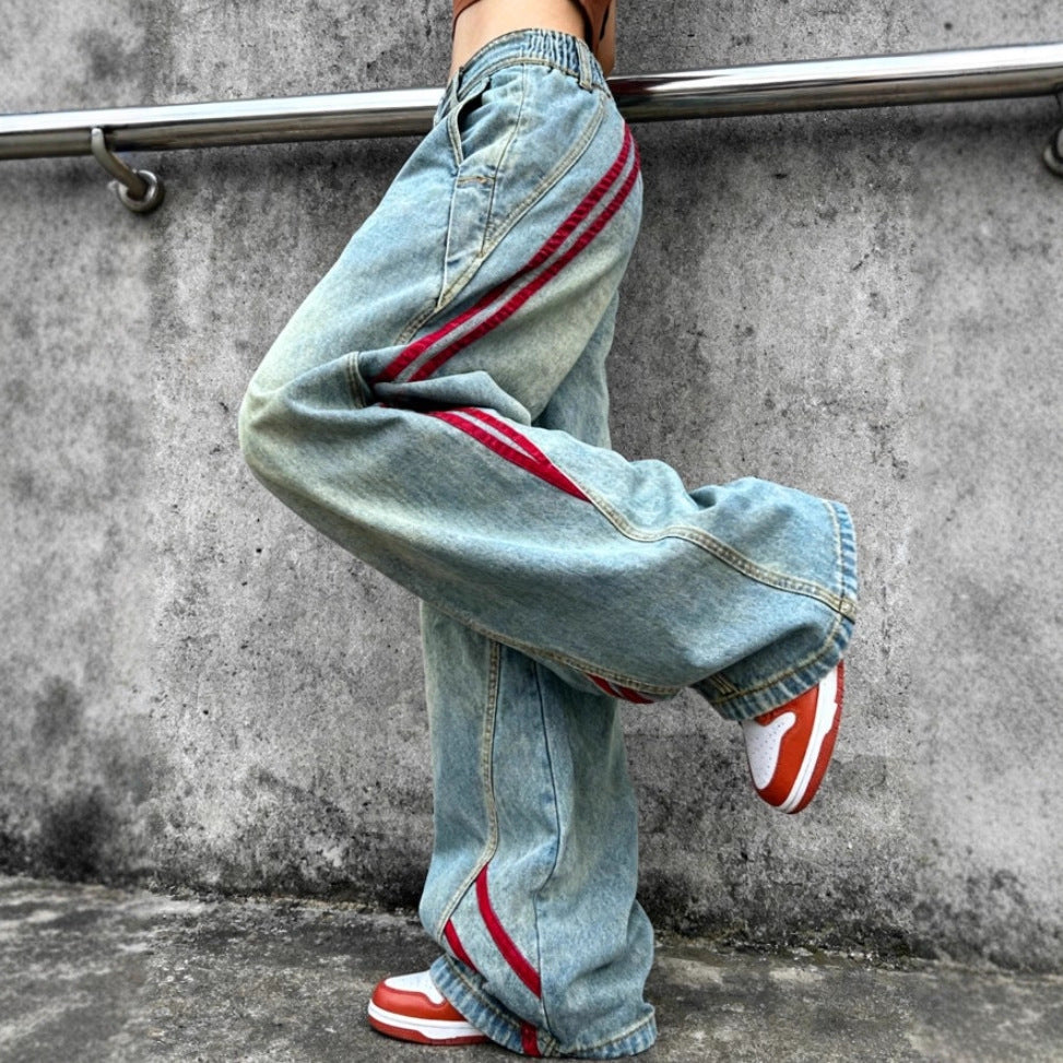 Women's low-rise extra-wide baggy jeans made of vintage denim with side tape stripes Chichicherry