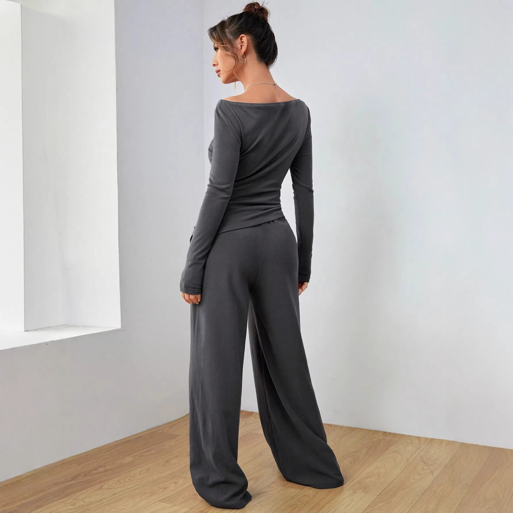 Women’s loungewear set made of softly falling jersey with a boat neckline, fitted long sleeve, and wide palazzo pants Chichicherry